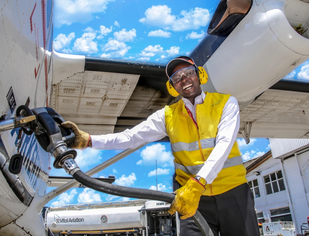man refuiling a aircraft